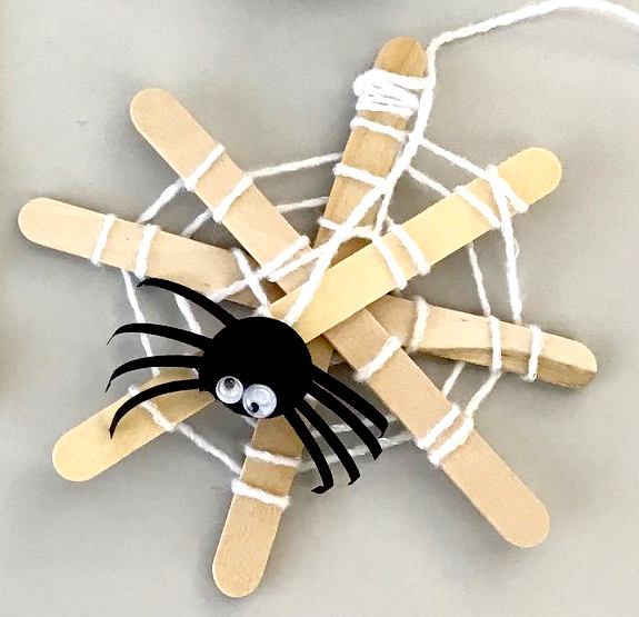 popsicle stick web and goofy spider craft